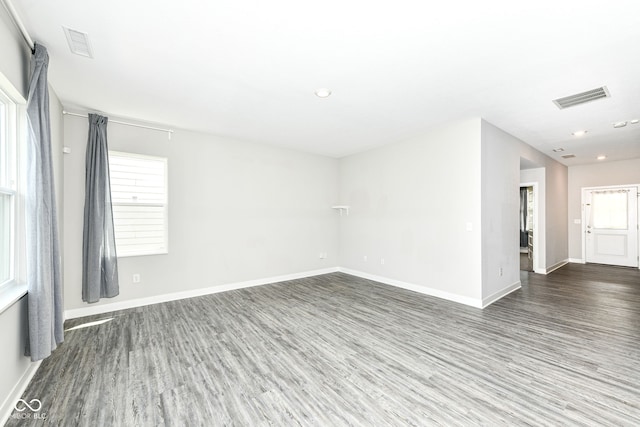 2234 S Bingham Pl, New Palestine, IN 46163 - unfurnished room featuring wood finished floors, plenty of natural light, and recessed lighting