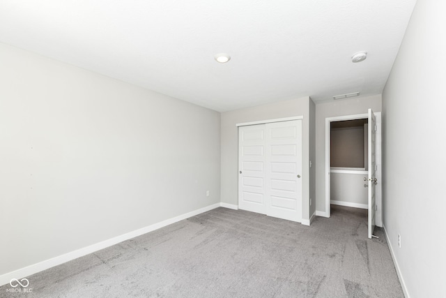 2234 S Bingham Pl, New Palestine, IN 46163 - unfurnished bedroom featuring carpet and a closet
