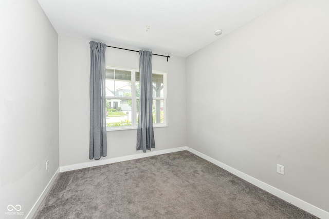 2234 S Bingham Pl, New Palestine, IN 46163 - unfurnished room with carpet floors and a smoke detector