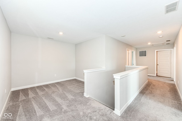 2234 S Bingham Pl, New Palestine, IN 46163 - hall with an upstairs landing, light carpet, and recessed lighting
