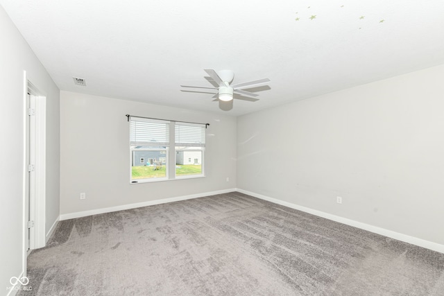 2234 S Bingham Pl, New Palestine, IN 46163 - spare room featuring carpet and a ceiling fan