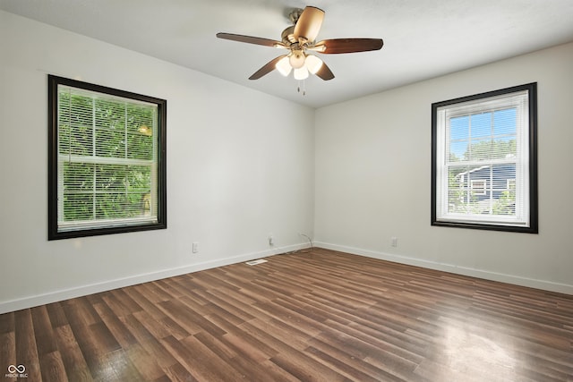8041 Barry Rd, Indianapolis, IN 46219 - empty room with wood finished floors and ceiling fan