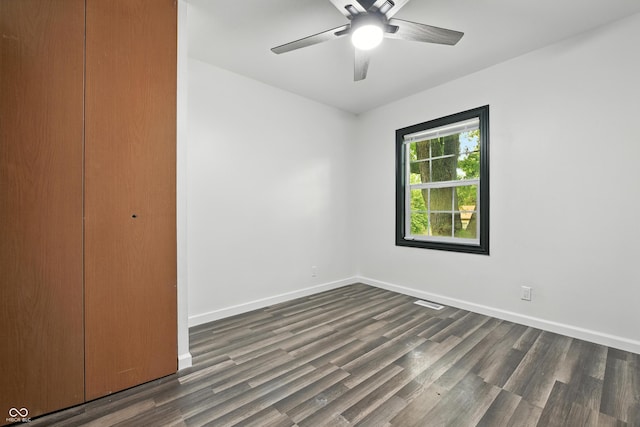 8041 Barry Rd, Indianapolis, IN 46219 - unfurnished bedroom with wood finished floors, a closet, and ceiling fan
