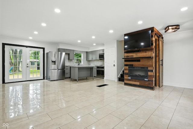 8041 Barry Rd, Indianapolis, IN 46219 - living area featuring light tile patterned floors, recessed lighting, and french doors