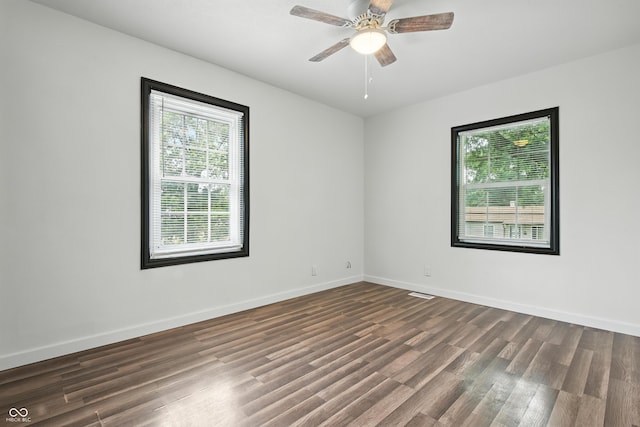 8041 Barry Rd, Indianapolis, IN 46219 - unfurnished room featuring wood finished floors and ceiling fan
