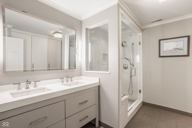 35 E 58th St, Indianapolis, IN 46220 - bathroom with crown molding, double vanity, a stall shower, and tile patterned floors