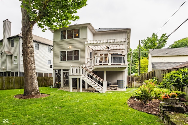 35 E 58th St, Indianapolis, IN 46220 - rear view of property featuring stairs, a pergola, a deck, a fenced backyard, and board and batten siding
