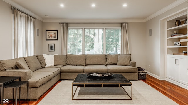 35 E 58th St, Indianapolis, IN 46220 - living area featuring wood finished floors, ornamental molding, and recessed lighting