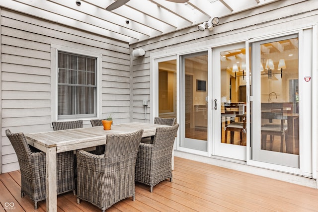 35 E 58th St, Indianapolis, IN 46220 - wooden deck with outdoor dining area and a pergola