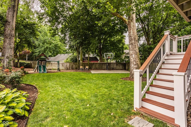 35 E 58th St, Indianapolis, IN 46220 - view of yard with a playground and stairway