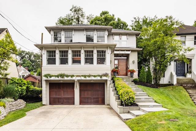 35 E 58th St, Indianapolis, IN 46220 - view of front facade featuring driveway, a garage, stairs, and a front yard
