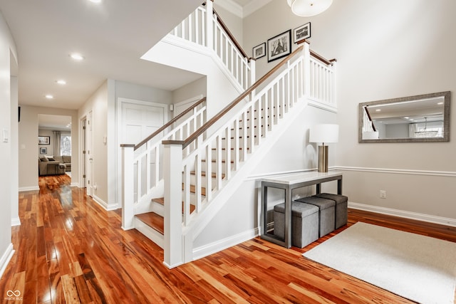 35 E 58th St, Indianapolis, IN 46220 - staircase with wood finished floors and recessed lighting