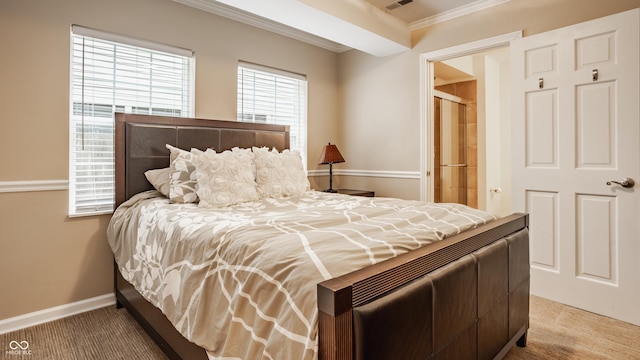 35 E 58th St, Indianapolis, IN 46220 - carpeted bedroom with ornamental molding and baseboards