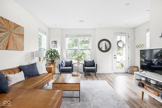 2539 Broadway St, Indianapolis, IN 46205 - living room featuring wood finished floors and baseboards