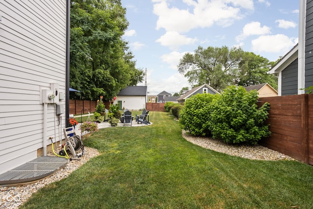 2539 Broadway St, Indianapolis, IN 46205 - fenced backyard with a patio area