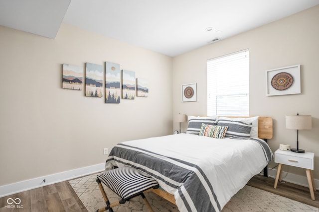 2539 Broadway St, Indianapolis, IN 46205 - bedroom featuring baseboards and wood finished floors