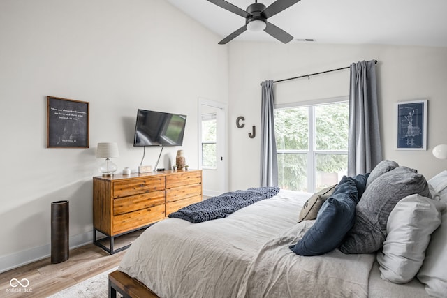2539 Broadway St, Indianapolis, IN 46205 - bedroom with wood finished floors, high vaulted ceiling, and ceiling fan