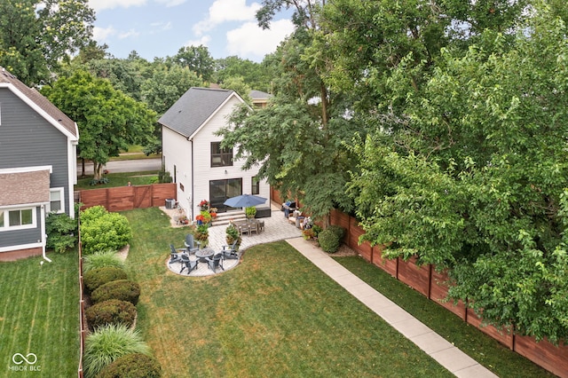 2539 Broadway St, Indianapolis, IN 46205 - fenced backyard featuring a patio area