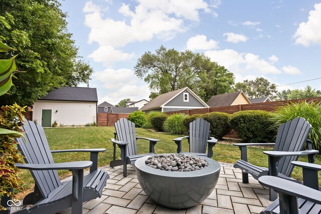 2539 Broadway St, Indianapolis, IN 46205 - view of patio / terrace with a fire pit and an outdoor structure