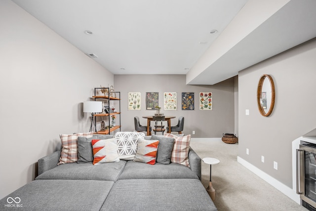 2539 Broadway St, Indianapolis, IN 46205 - carpeted living area featuring beverage cooler and baseboards