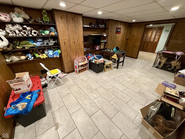 910 Ranch Rd, Connersville, IN 47331 - finished below grade area featuring wooden walls, a paneled ceiling, and recessed lighting