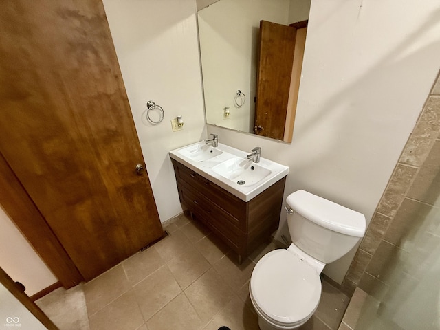 910 Ranch Rd, Connersville, IN 47331 - bathroom featuring double vanity and tile patterned flooring
