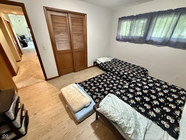 910 Ranch Rd, Connersville, IN 47331 - bedroom featuring a closet and light wood finished floors