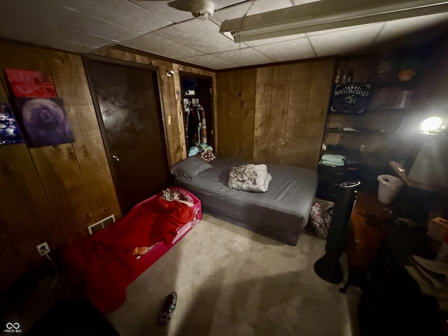 910 Ranch Rd, Connersville, IN 47331 - misc room with wooden walls and concrete floors