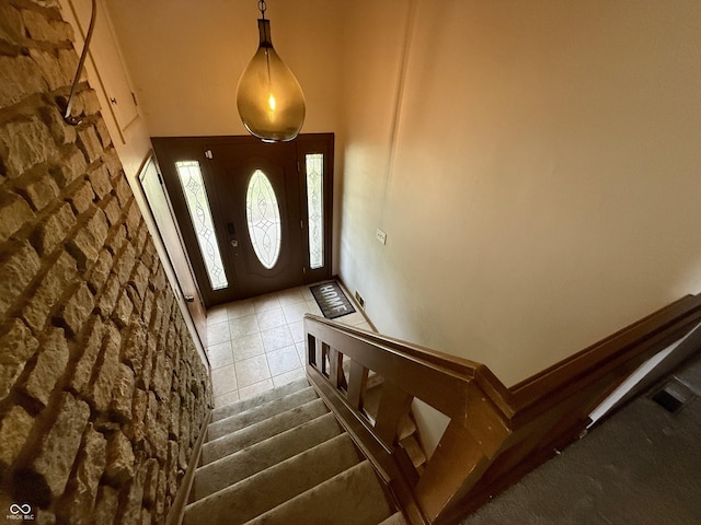 910 Ranch Rd, Connersville, IN 47331 - tiled entryway with stairway