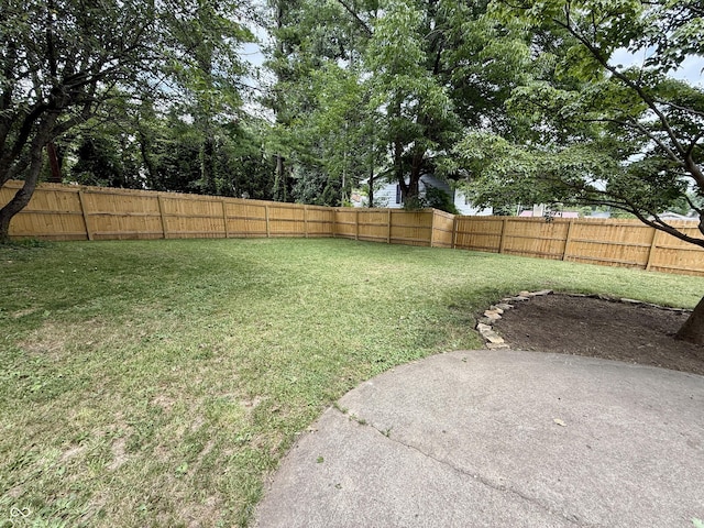 910 Ranch Rd, Connersville, IN 47331 - fenced backyard featuring a patio area