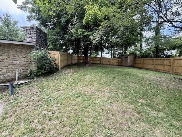910 Ranch Rd, Connersville, IN 47331 - fenced backyard featuring a storage shed