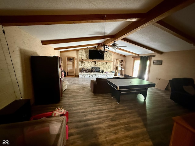910 Ranch Rd, Connersville, IN 47331 - game room with dark wood-type flooring, a fireplace, a ceiling fan, and a textured ceiling