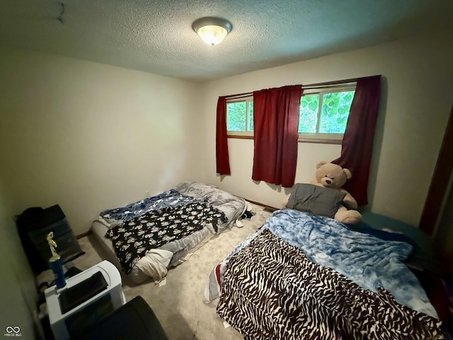 910 Ranch Rd, Connersville, IN 47331 - carpeted bedroom featuring a textured ceiling