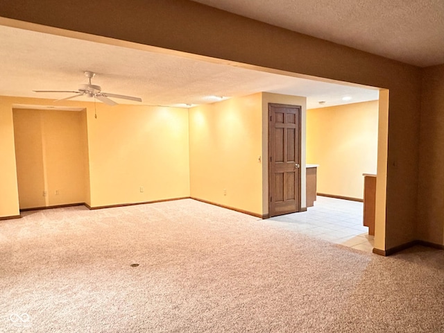 5720 Bayside Dr, Fort Wayne, IN 46815 - empty room featuring a textured ceiling, light carpet, and ceiling fan