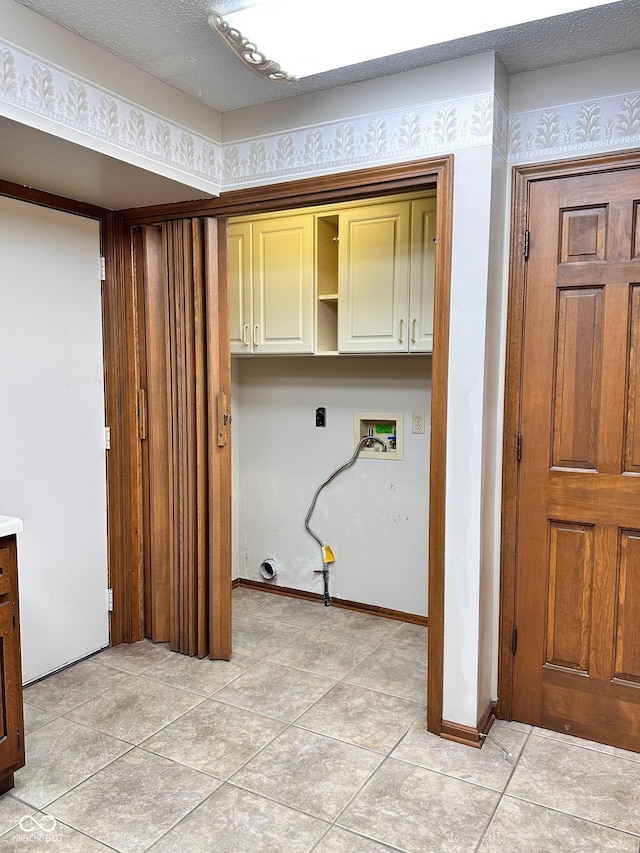 5720 Bayside Dr, Fort Wayne, IN 46815 - washroom with cabinet space, washer hookup, and light tile patterned floors