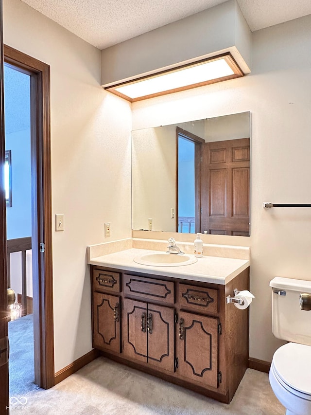 5720 Bayside Dr, Fort Wayne, IN 46815 - half bathroom featuring vanity and a textured ceiling