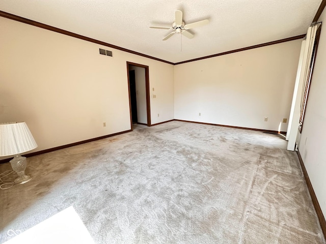 5720 Bayside Dr, Fort Wayne, IN 46815 - unfurnished room featuring a ceiling fan, carpet, crown molding, and a textured ceiling
