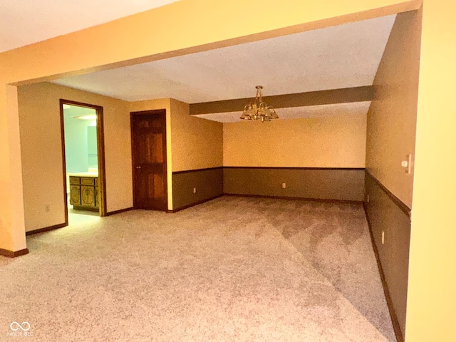 5720 Bayside Dr, Fort Wayne, IN 46815 - carpeted empty room with a chandelier