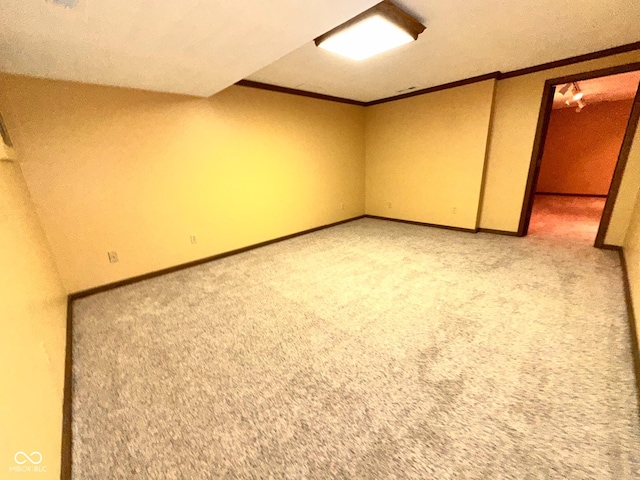 5720 Bayside Dr, Fort Wayne, IN 46815 - finished below grade area featuring ornamental molding and light colored carpet