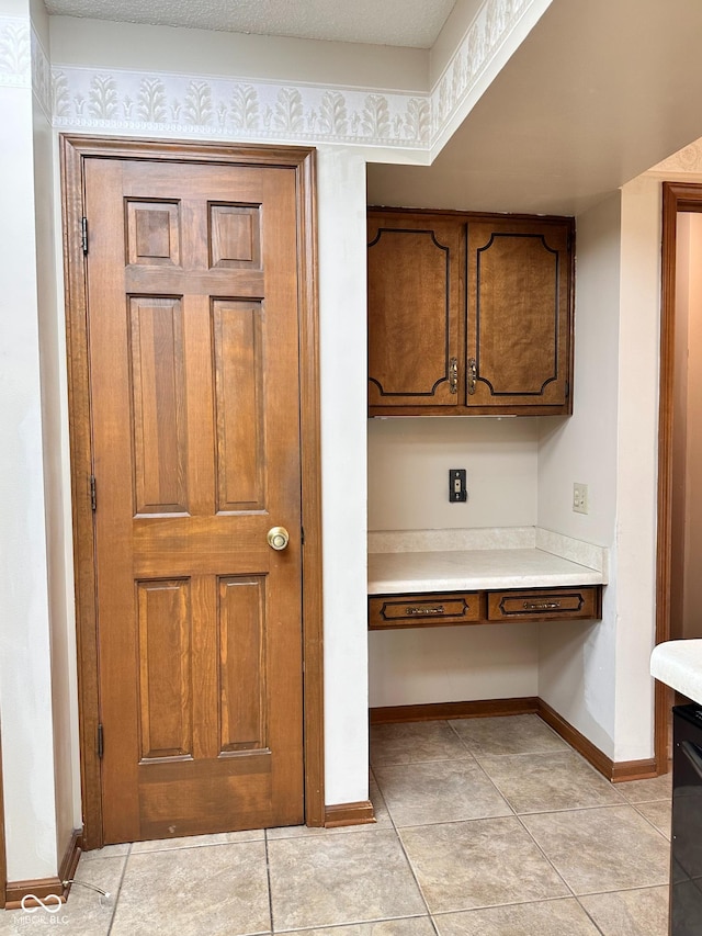 5720 Bayside Dr, Fort Wayne, IN 46815 - kitchen featuring light countertops and built in study area