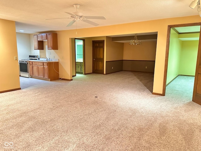 5720 Bayside Dr, Fort Wayne, IN 46815 - unfurnished living room with light colored carpet, a ceiling fan, a chandelier, and a textured ceiling