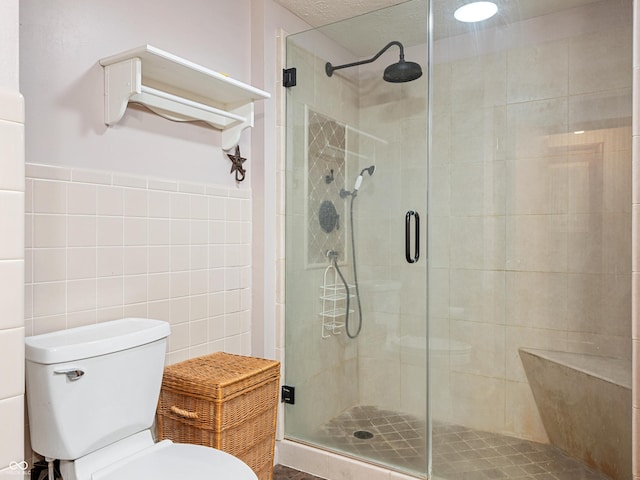 2601 N Everett St, Crawfordsville, IN 47933 - bathroom with a shower stall and tile walls
