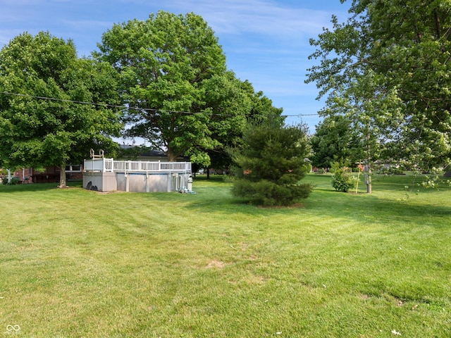 2601 N Everett St, Crawfordsville, IN 47933 - view of green lawn featuring an outdoor pool