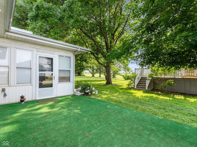 2601 N Everett St, Crawfordsville, IN 47933 - view of grassy yard featuring a deck and stairway