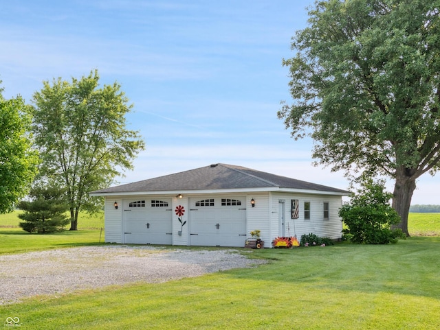 2601 N Everett St, Crawfordsville, IN 47933 - single story home featuring a front yard and a detached garage