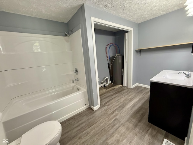 4833 Pennsylvania St, Clayton, IN 46118 - full bathroom with water heater, a textured ceiling, bathing tub / shower combination, wood finished floors, and vanity