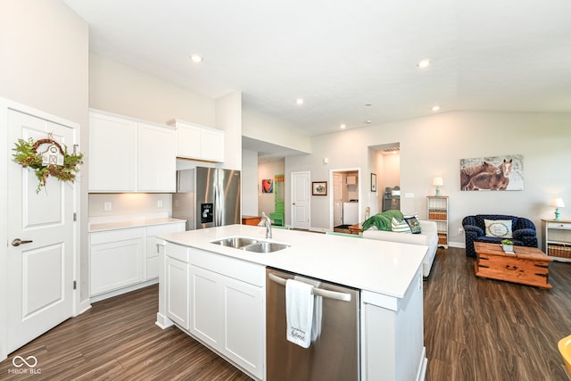 9846 Zion Way, Pendleton, IN 46064 - kitchen featuring appliances with stainless steel finishes, open floor plan, dark wood-style floors, light countertops, and white cabinetry