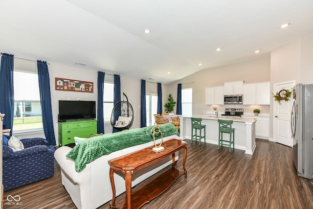 9846 Zion Way, Pendleton, IN 46064 - living area with dark wood-style floors, lofted ceiling, and recessed lighting
