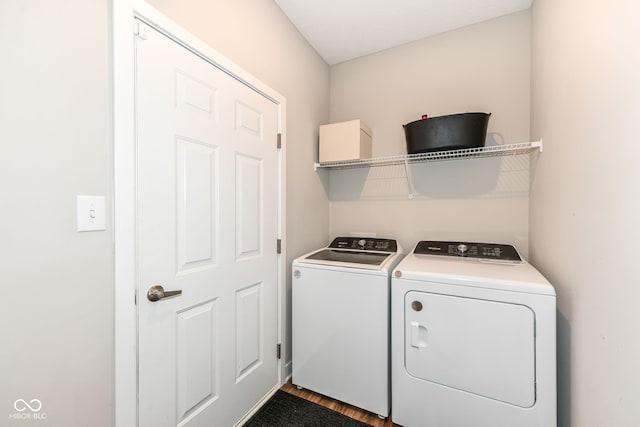 9846 Zion Way, Pendleton, IN 46064 - laundry area with washer and dryer and wood finished floors