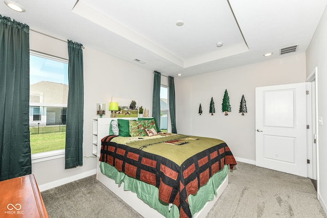 9846 Zion Way, Pendleton, IN 46064 - carpeted bedroom with multiple windows, recessed lighting, and a tray ceiling